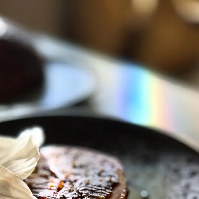 Royalburn lamb neck, plum, confit garlic, green pepper. Slowly cooked, boned, and rolled up.